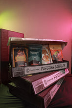 Load image into Gallery viewer, Be one of the lucky ones to experience our limited edition VHS Sampler Box.  A TOTAL OF 8 BAGS!!  What you get;  1 x bags of Naked with Sea Salt  1 x bags of Rosemary Salted Caramel  1 X Cinnamon Churro w/Salted Pretzels  1 x bag of Aussie BBQ  1 x bag of Mexican Hot Chocolate  1 x bag of Sweet Chile Lime  1 x bags of Bourbon Caramel Popcorn w/ Espresso Pretzels  1 x bag of Truffle
