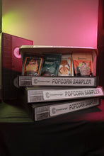 Load image into Gallery viewer, Be one of the lucky ones to experience our limited edition VHS Sampler Box.  A TOTAL OF 8 BAGS!!  What you get;  1 x bags of Naked with Sea Salt  1 x bags of Rosemary Salted Caramel  1 X Cinnamon Churro w/Salted Pretzels  1 x bag of Aussie BBQ  1 x bag of Mexican Hot Chocolate  1 x bag of Sweet Chile Lime  1 x bags of Bourbon Caramel Popcorn w/ Espresso Pretzels  1 x bag of Truffle
